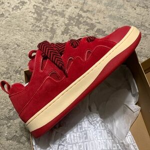 Red Steve Madden sneakers. Brand new never worn.